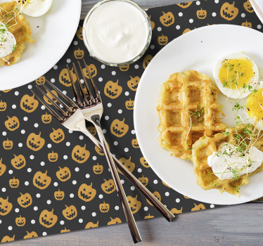 Scary pumpkins and cute dots  Halloween placemats. Black background. Pumpkin motif and white dots in a pattern. Sign up for 10% off!