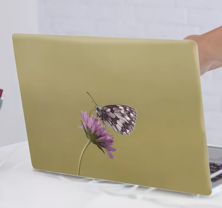 butterfly on flower laptop decal - TenStickers