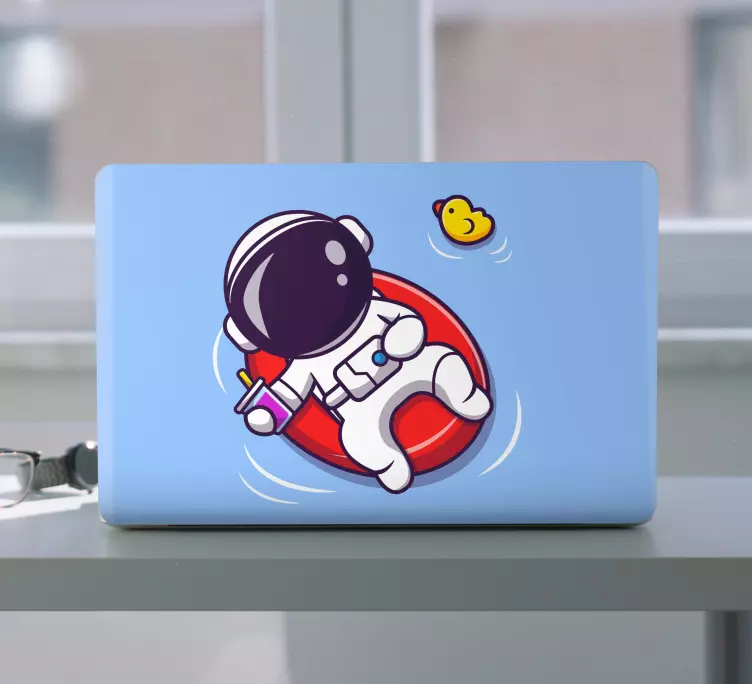 Chilling astronaut in donut laptop skins - TenStickers