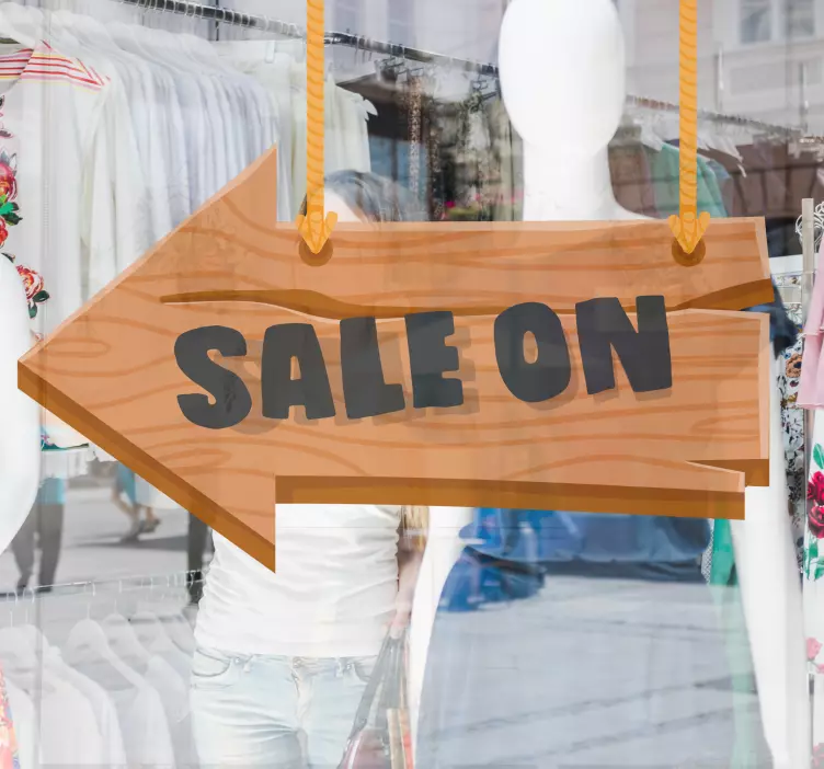 Wooden arrown hanging from ropes vinyl sign - TenStickers