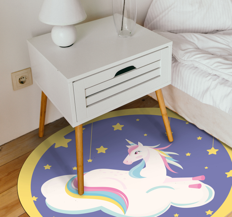 unicorn laying down on a cloud animal rug - TenStickers