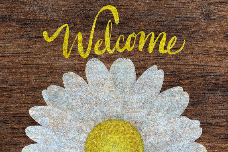 Daisy welcome message entrance hall vinyl rug - TenStickers